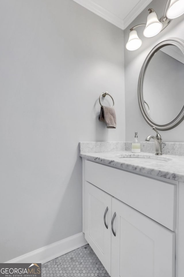 2535 Winthrope Way, Lawrenceville, GA 30044 - bathroom featuring crown molding, vanity, tile patterned floors, and baseboards