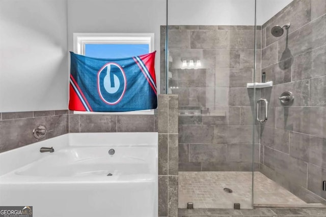 51 Waterfowl Ct, Jefferson, GA 30549 - bathroom featuring a stall shower and a garden tub