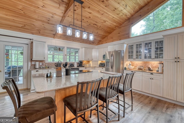 311 Lonesome Pine Trl, Blairsville, GA 30512 - kitchen featuring stainless steel refrigerator with ice dispenser, decorative backsplash, wood ceiling, light wood-style floors, and white cabinets