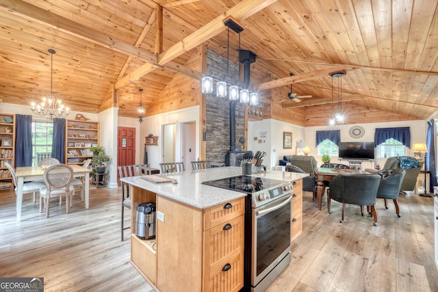 311 Lonesome Pine Trl, Blairsville, GA 30512 - kitchen featuring electric range, a wood stove, wood ceiling with exposed beams, open floor plan, and light wood finished floors