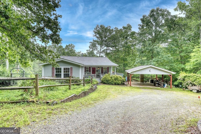 311 Lonesome Pine Trl, Blairsville, GA 30512 - ranch-style house featuring gravel driveway, a porch, and roof with shingles