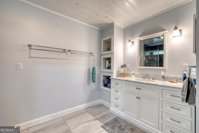 311 Lonesome Pine Trl, Blairsville, GA 30512 - bathroom with crown molding, vanity, baseboards, and wood ceiling