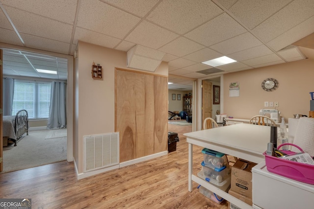 311 Lonesome Pine Trl, Blairsville, GA 30512 - kitchen with a paneled ceiling, wood finished floors, and baseboards
