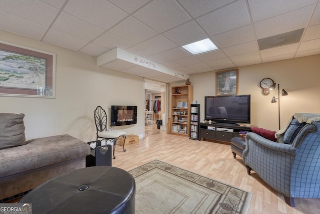 311 Lonesome Pine Trl, Blairsville, GA 30512 - living area featuring wood finished floors and a paneled ceiling