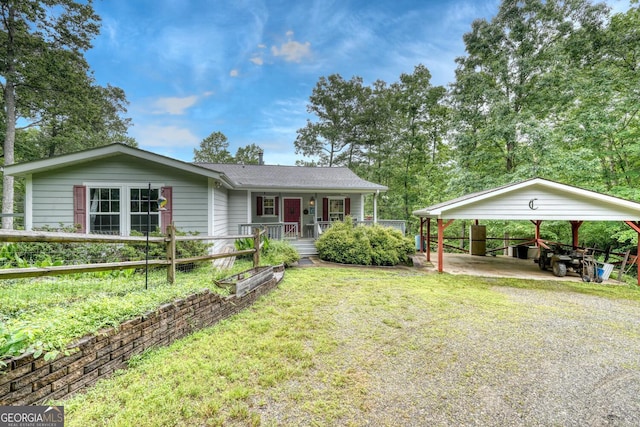 311 Lonesome Pine Trl, Blairsville, GA 30512 - ranch-style home with covered porch, driveway, and a carport