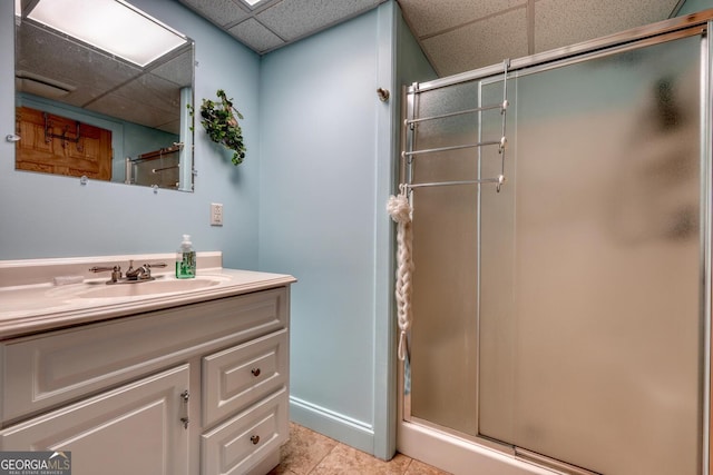 311 Lonesome Pine Trl, Blairsville, GA 30512 - full bath featuring a drop ceiling, a stall shower, vanity, and tile patterned flooring