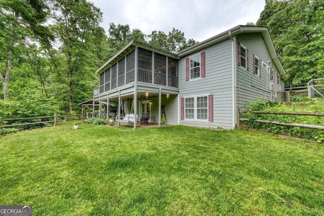 311 Lonesome Pine Trl, Blairsville, GA 30512 - back of property with a sunroom