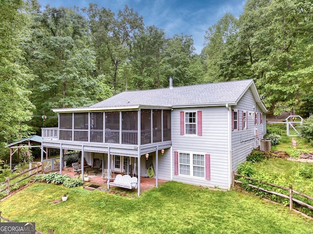 311 Lonesome Pine Trl, Blairsville, GA 30512 - back of house featuring a sunroom, cooling unit, a patio area, roof with shingles, and a deck