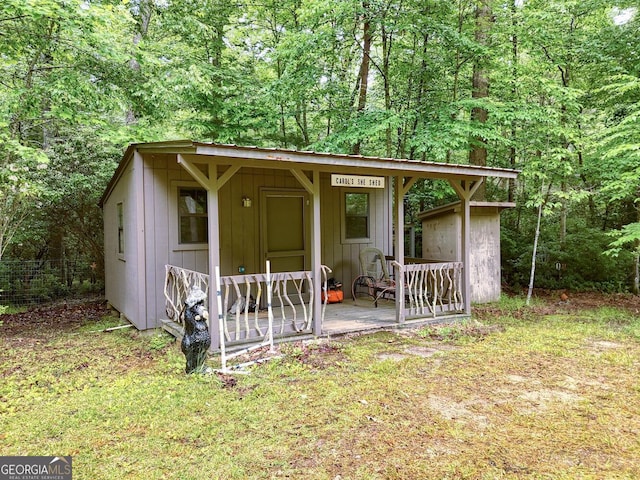 311 Lonesome Pine Trl, Blairsville, GA 30512 - view of outbuilding with a forest view