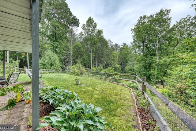 311 Lonesome Pine Trl, Blairsville, GA 30512 - view of yard with a garden and a forest view