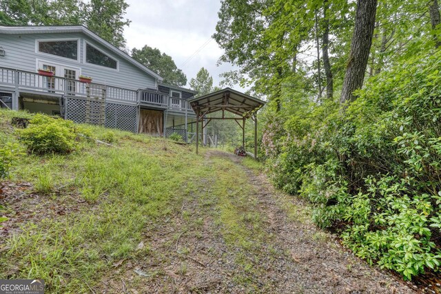 311 Lonesome Pine Trl, Blairsville, GA 30512 - view of yard with a deck and a detached carport