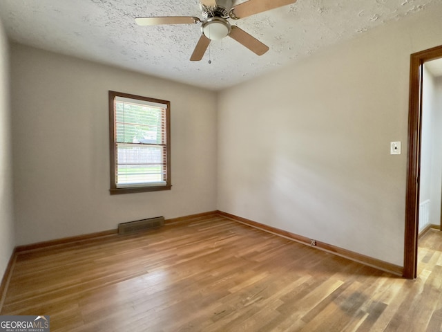 4 Walton Way NW, Rome, GA 30165 - empty room featuring light wood finished floors, baseboards, a ceiling fan, and a textured ceiling