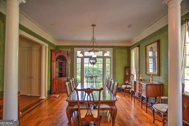 12001 Layfield Rd, Upatoi, GA 31829 - dining room with ornate columns, dark wood finished floors, and ornamental molding