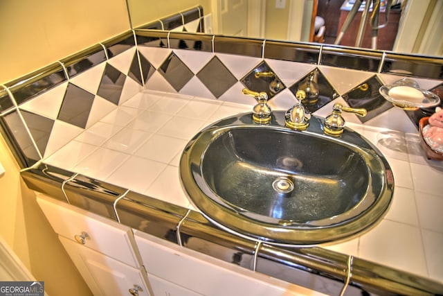 12001 Layfield Rd, Upatoi, GA 31829 - bathroom view of tasteful backsplash and a sink