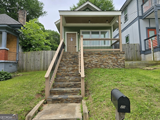490 Rockwell St SW, Atlanta, GA 30310 - shotgun-style home featuring stairway