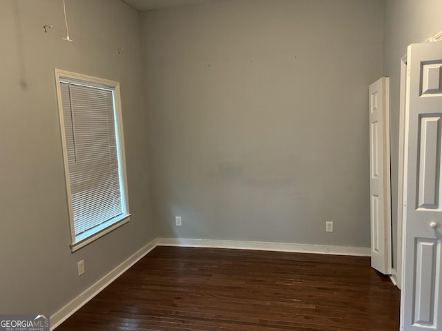 490 Rockwell St SW, Atlanta, GA 30310 - spare room with dark wood-style floors and baseboards