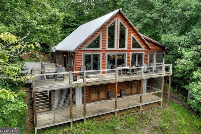 190 Toccoa Heights Rd, Blue Ridge, GA 30513 - back of house featuring outdoor dining area, faux log siding, and a wooden deck
