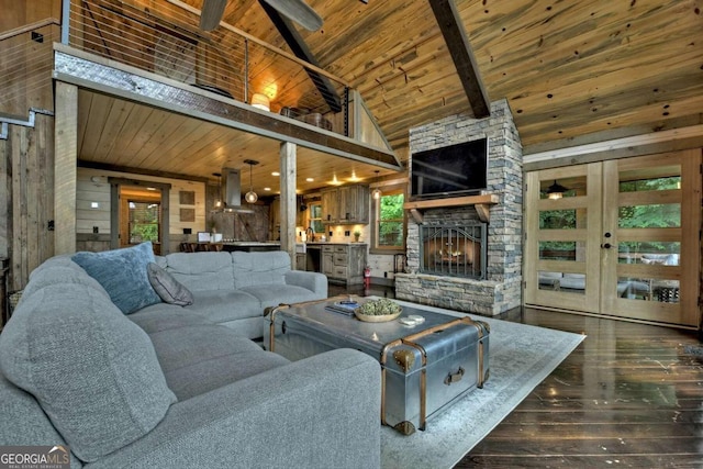 190 Toccoa Heights Rd, Blue Ridge, GA 30513 - living area featuring wooden ceiling with exposed beams, hardwood / wood-style flooring, a ceiling fan, a fireplace, and high vaulted ceiling