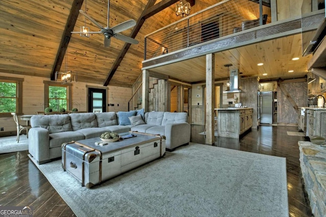 190 Toccoa Heights Rd, Blue Ridge, GA 30513 - living room featuring wood ceiling with exposed beams, ceiling fan, dark wood-type flooring, wood walls, and stairway