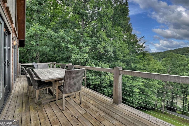 190 Toccoa Heights Rd, Blue Ridge, GA 30513 - deck with outdoor dining space and a wooded view