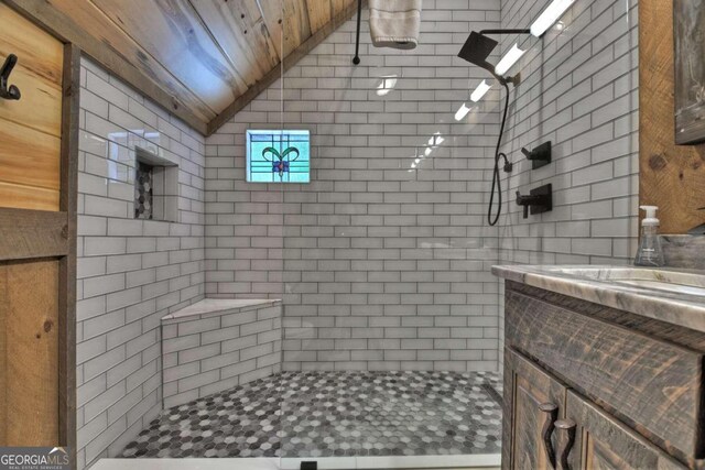 190 Toccoa Heights Rd, Blue Ridge, GA 30513 - bathroom with lofted ceiling, a tile shower, vanity, and wooden ceiling