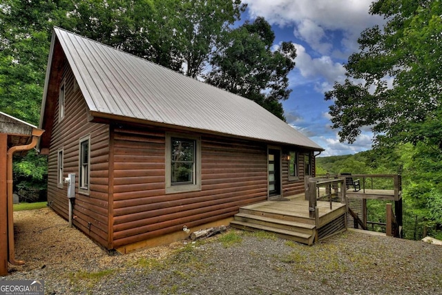 190 Toccoa Heights Rd, Blue Ridge, GA 30513 - view of side of property featuring a deck, log veneer siding, and metal roof