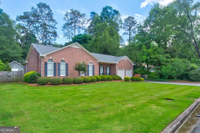 17 Rosewood Rd SW, Rome, GA 30165 - view of front of home with brick siding, a garage, and driveway