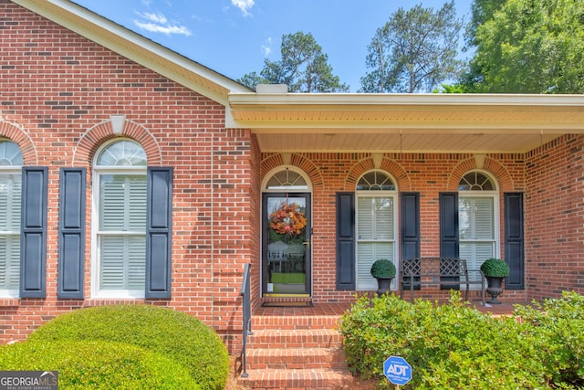 17 Rosewood Rd SW, Rome, GA 30165 - view of exterior entry featuring brick siding and a porch