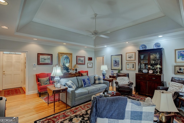 17 Rosewood Rd SW, Rome, GA 30165 - living area featuring a tray ceiling, wood finished floors, a ceiling fan, baseboards, and ornamental molding