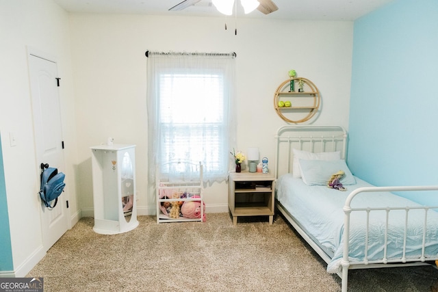 1325 Adams Rd, Meansville, GA 30256 - bedroom with carpet floors, baseboards, and ceiling fan