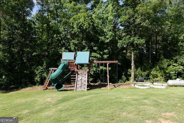 1325 Adams Rd, Meansville, GA 30256 - view of jungle gym featuring a lawn