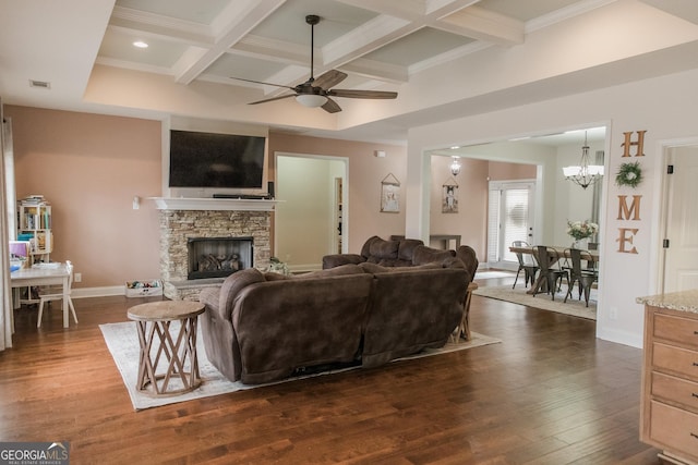 1325 Adams Rd, Meansville, GA 30256 - living area featuring dark wood-type flooring, a ceiling fan, beam ceiling, coffered ceiling, and a chandelier