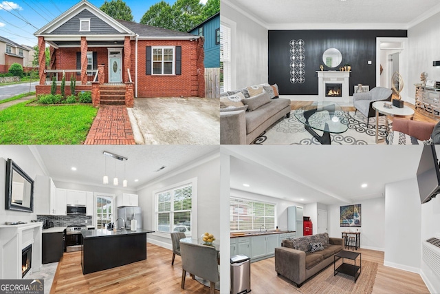 50 Ormond St SW, Atlanta, GA 30315 - living area with a lit fireplace, light wood-style floors, ornamental molding, an accent wall, and baseboards