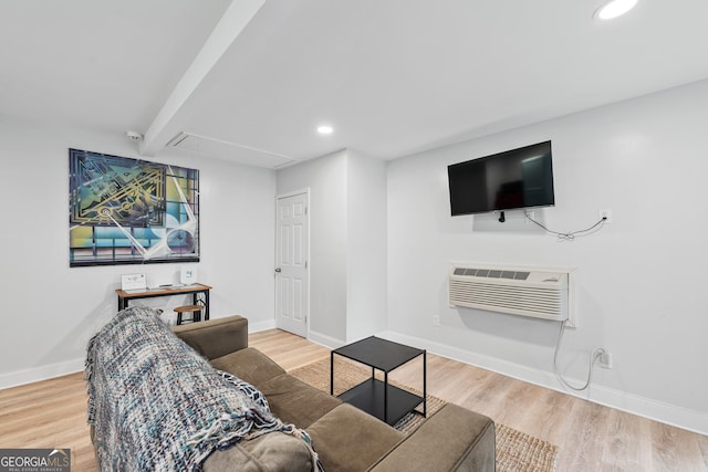 50 Ormond St SW, Atlanta, GA 30315 - living room with attic access, wood finished floors, recessed lighting, baseboards, and a wall mounted air conditioner
