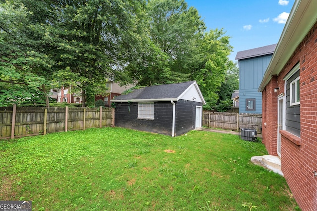 50 Ormond St SW, Atlanta, GA 30315 - view of yard featuring cooling unit and an outbuilding