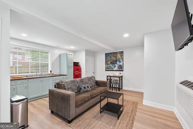50 Ormond St SW, Atlanta, GA 30315 - living area featuring light wood-style floors, recessed lighting, and baseboards