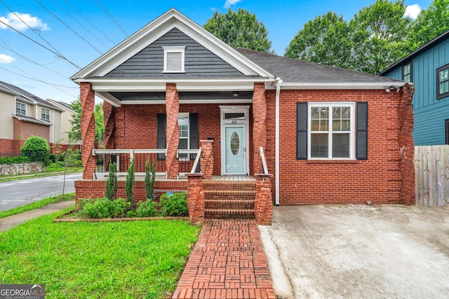 50 Ormond St SW, Atlanta, GA 30315 - view of front of property featuring brick siding and a porch
