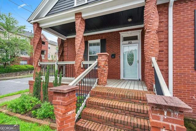 50 Ormond St SW, Atlanta, GA 30315 - view of exterior entry featuring a porch and brick siding