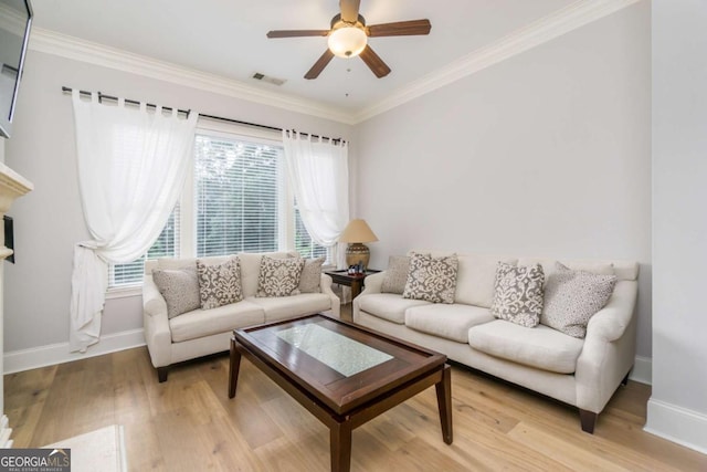 11 Perimeter Ctr E Unit 1412, Atlanta, GA 30346 - living area featuring light wood finished floors, plenty of natural light, ornamental molding, and ceiling fan