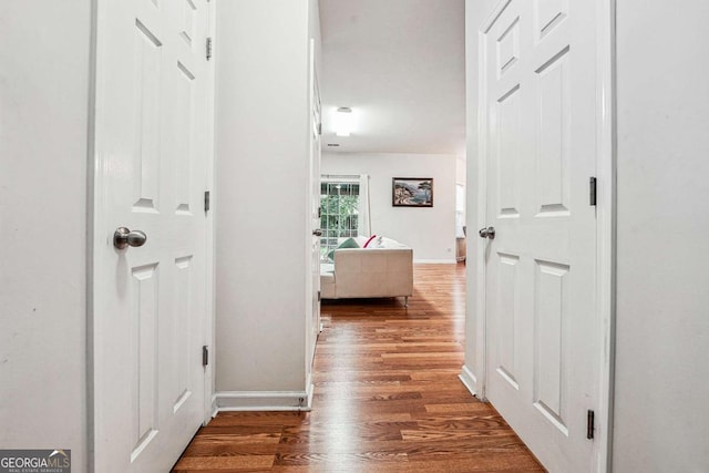 2545 Gatewater Ct, Cumming, GA 30040 - hall featuring wood finished floors and baseboards