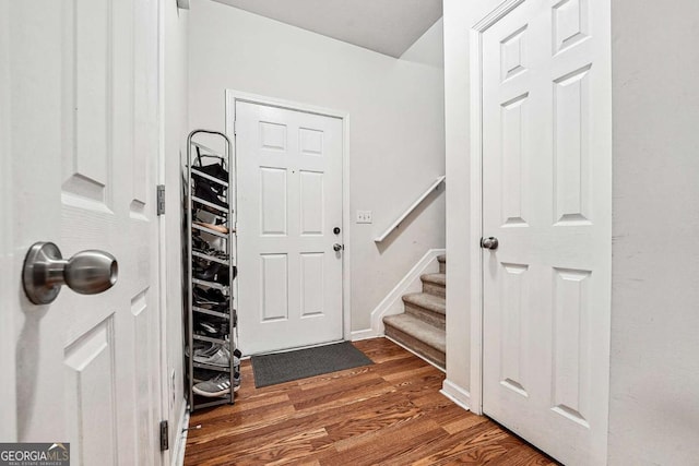 2545 Gatewater Ct, Cumming, GA 30040 - entryway featuring dark wood-type flooring, stairs, and baseboards