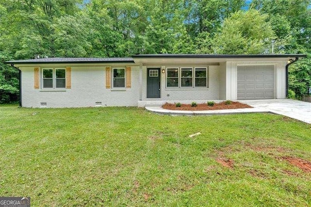 327 Marty Ln, Dallas, GA 30132 - view of front of home featuring a garage, driveway, a front yard, and brick siding