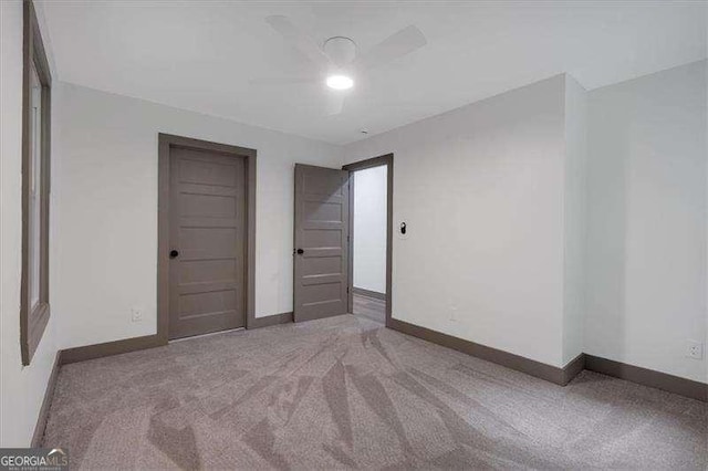 327 Marty Ln, Dallas, GA 30132 - unfurnished bedroom featuring carpet flooring and ceiling fan