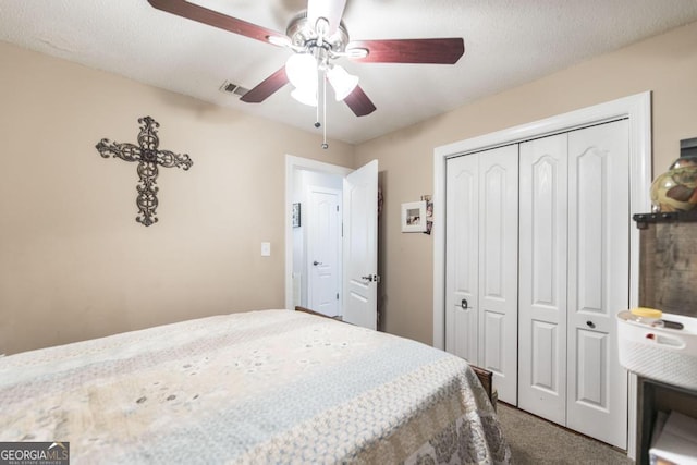 213 Feagin Mill Rd, Warner Robins, GA 31088 - bedroom with carpet flooring, a closet, and ceiling fan