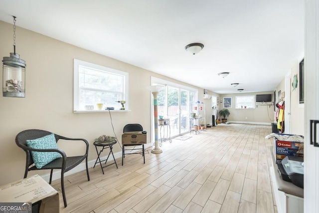 213 Feagin Mill Rd, Warner Robins, GA 31088 - living area featuring wood finished floors and baseboards