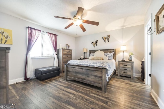 213 Feagin Mill Rd, Warner Robins, GA 31088 - bedroom featuring dark wood-style floors, baseboards, and ceiling fan