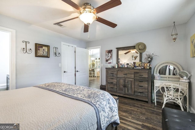 213 Feagin Mill Rd, Warner Robins, GA 31088 - bedroom with dark wood-type flooring and a ceiling fan