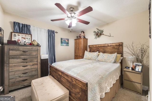 213 Feagin Mill Rd, Warner Robins, GA 31088 - bedroom with light colored carpet and a ceiling fan
