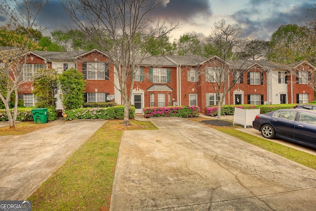 5587 Strathmoor Manor Cir, Lithonia, GA 30058 - townhome / multi-family property with brick siding