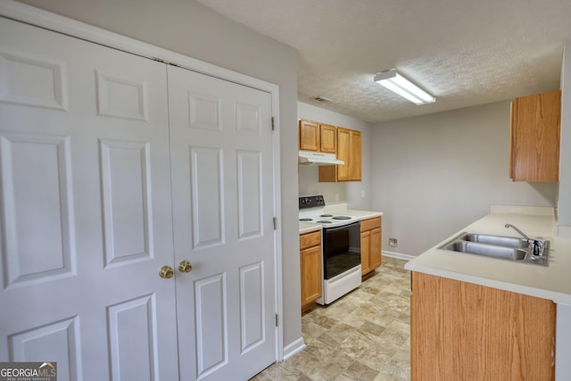 5587 Strathmoor Manor Cir, Lithonia, GA 30058 - kitchen with white range with electric stovetop, under cabinet range hood, a sink, light countertops, and a textured ceiling